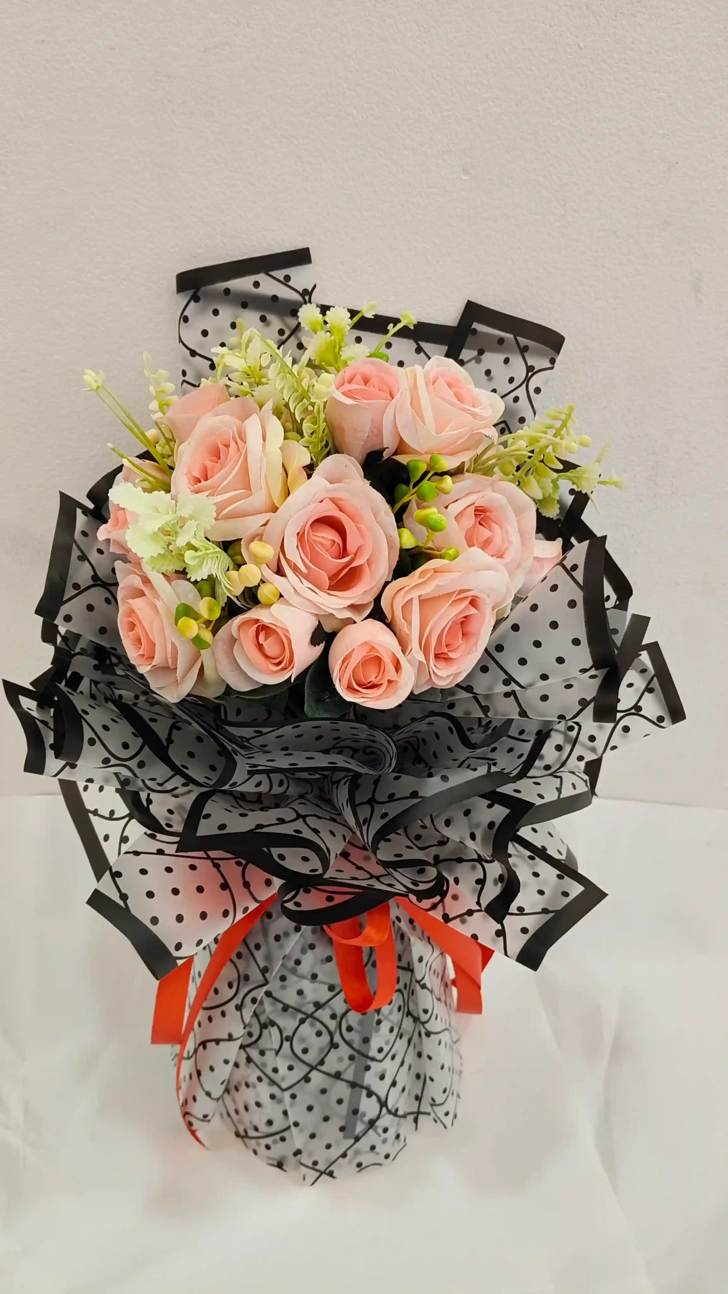 Artificial bouquet light yellow and pink rose .AED 70